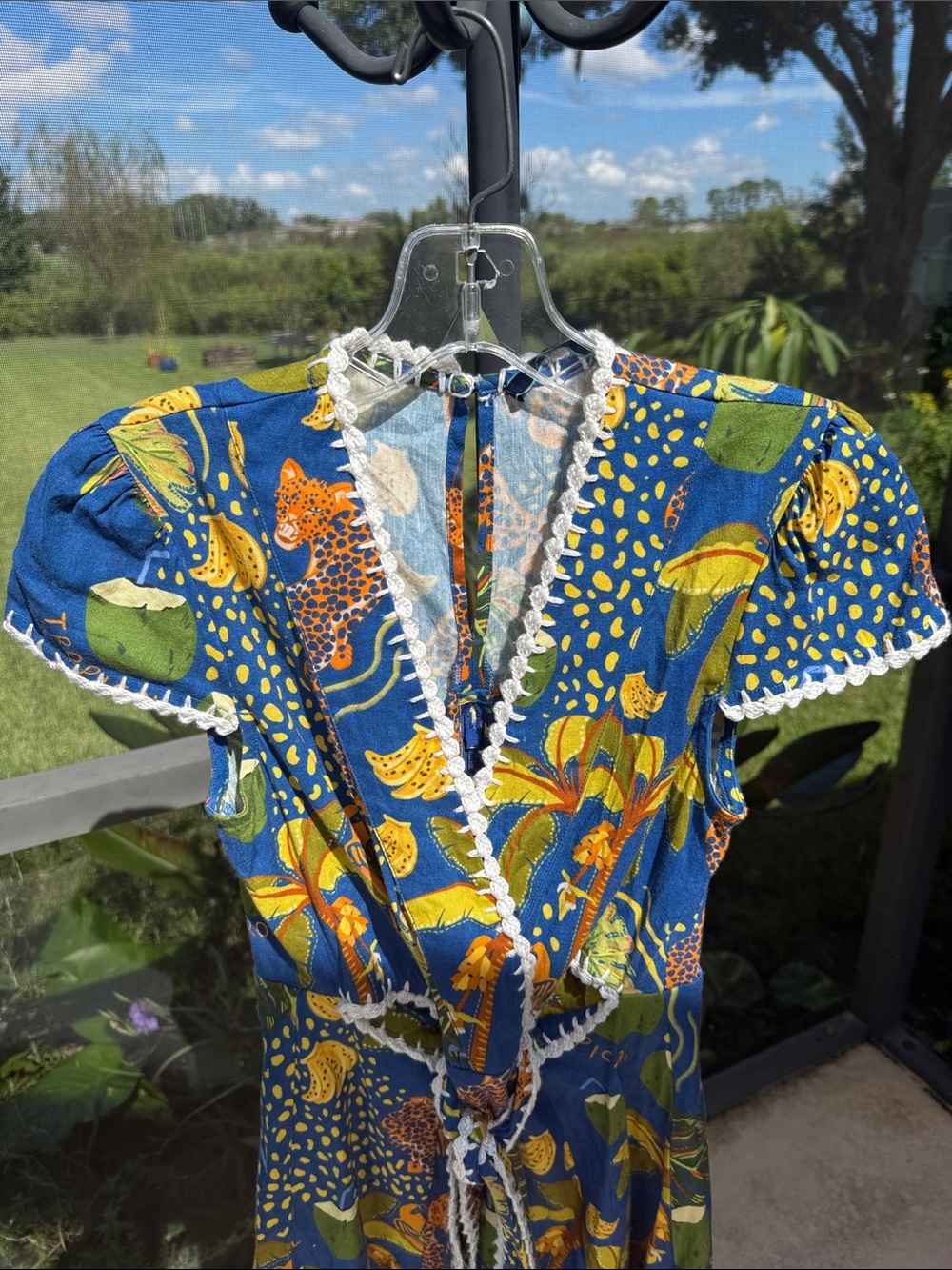 Shore Blue Tropical Print Mini Wrap Dress with White crochet Lace Trim